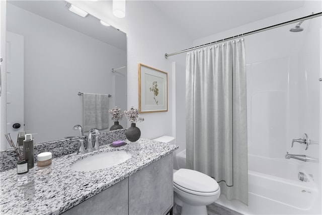 full bathroom featuring vanity, toilet, and shower / bathtub combination with curtain