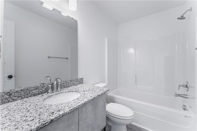 full bathroom featuring shower / washtub combination, vanity, and toilet