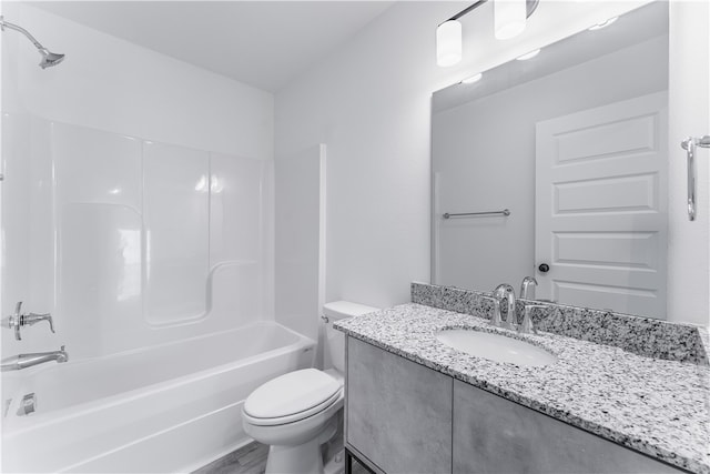 full bathroom with shower / tub combination, hardwood / wood-style flooring, vanity, and toilet