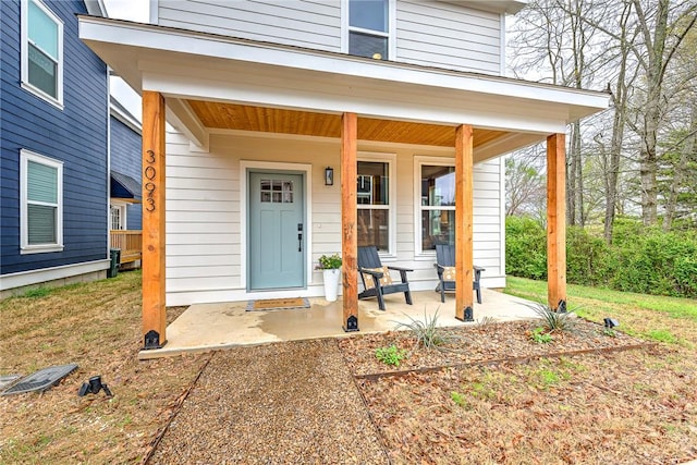 entrance to property with a porch