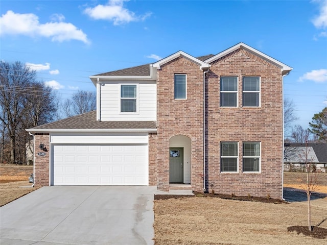 view of front of home with a garage