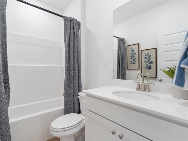 full bathroom featuring shower / bathtub combination with curtain, vanity, and toilet