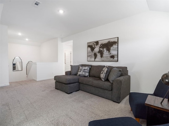 living room with light carpet and lofted ceiling