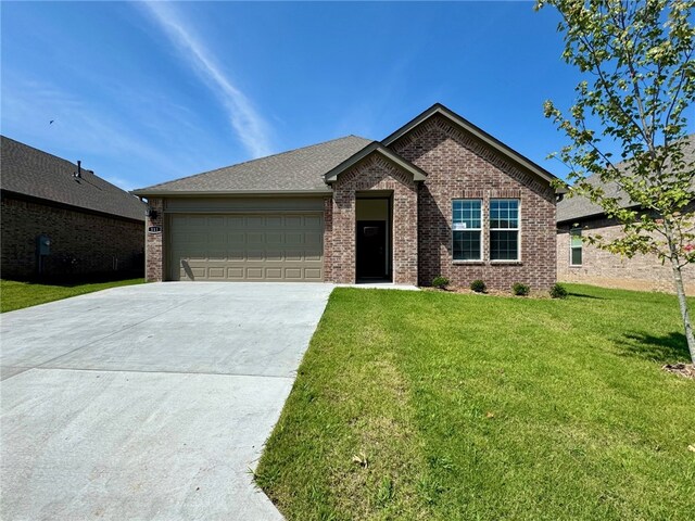 1961 Larkspur St, Springdale, AR 72762 - single story home with a garage, driveway, brick siding, and a front lawn