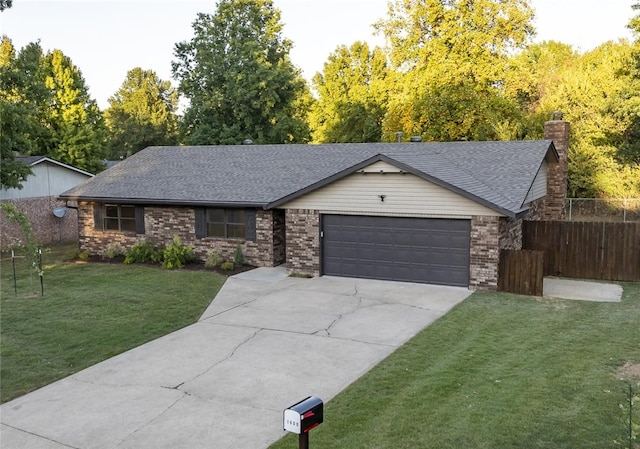 ranch-style house with a front yard and a garage