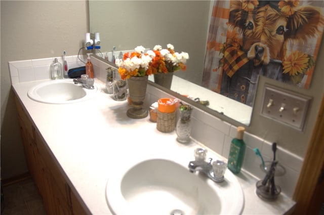 bathroom featuring tile patterned floors and vanity