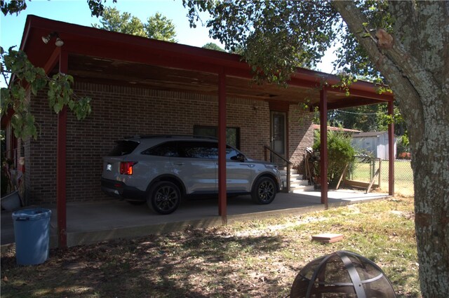 view of parking with a carport