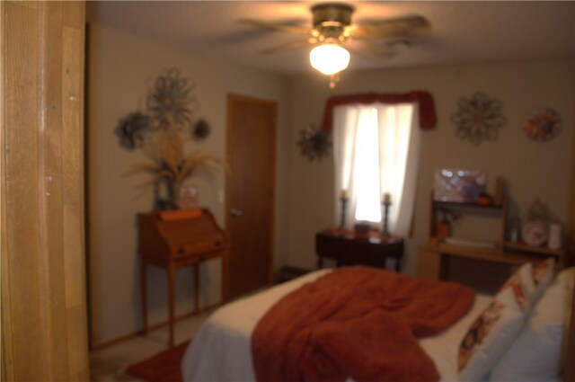 bedroom featuring ceiling fan