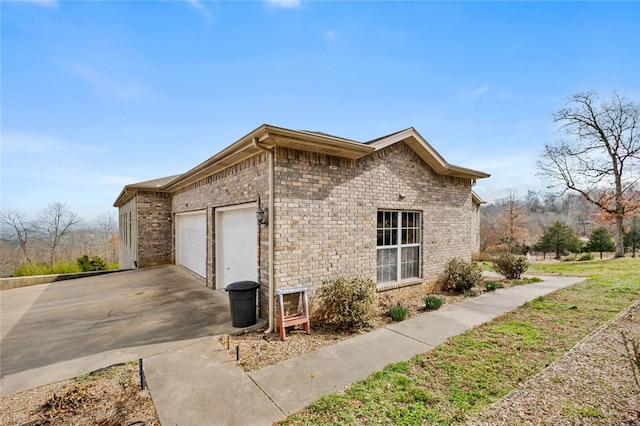 view of side of property featuring a garage