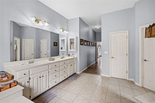 bathroom with vanity and tile patterned floors