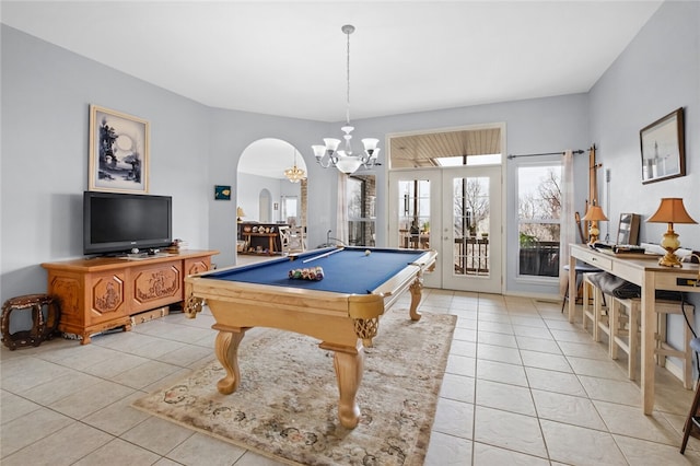 rec room with french doors, light tile patterned floors, billiards, and a notable chandelier