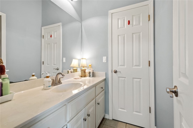 bathroom featuring vanity and tile patterned flooring