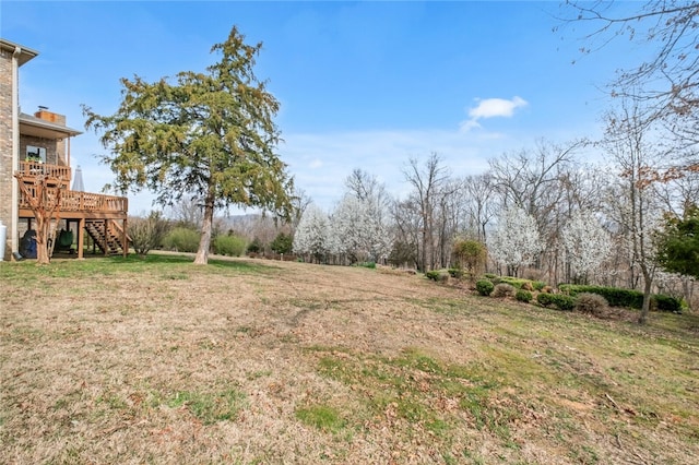 view of yard featuring a deck