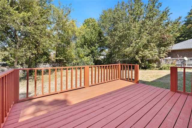 deck featuring a lawn