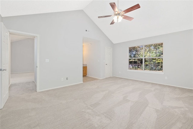 interior space featuring ceiling fan and high vaulted ceiling