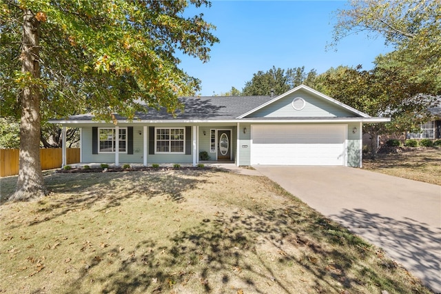 single story home with covered porch and a garage