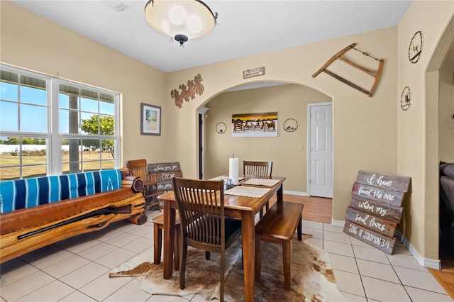 view of tiled dining space