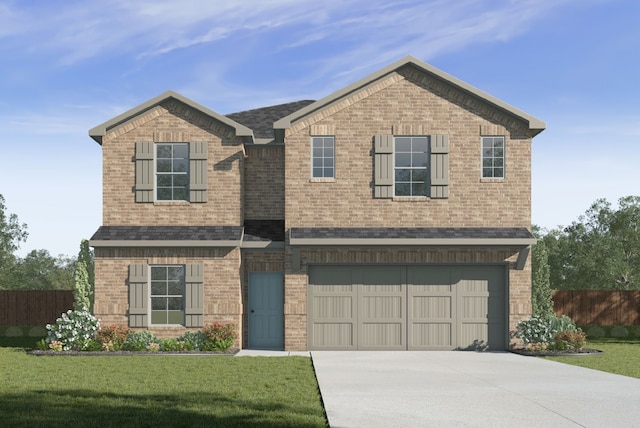 view of front of property with a front yard and a garage