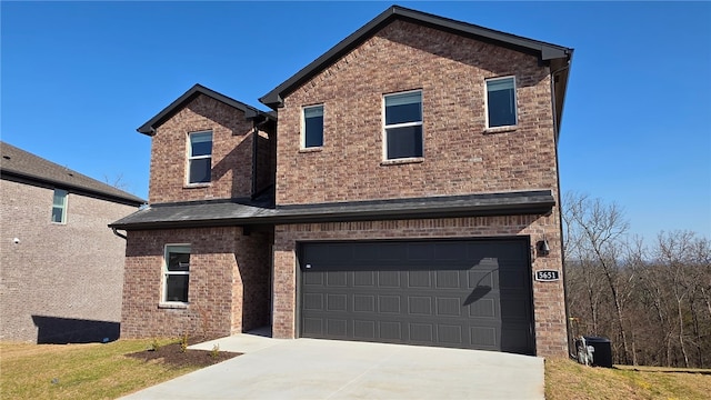 5395 Selah St, Springdale, AR 72764 - view of front facade featuring brick siding, concrete driveway, and a garage
