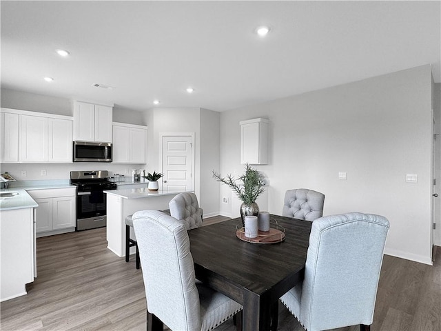 5395 Selah St, Springdale, AR 72764 - dining space featuring recessed lighting and light wood-style flooring