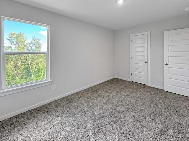5395 Selah St, Springdale, AR 72764 - unfurnished bedroom featuring carpet floors and baseboards