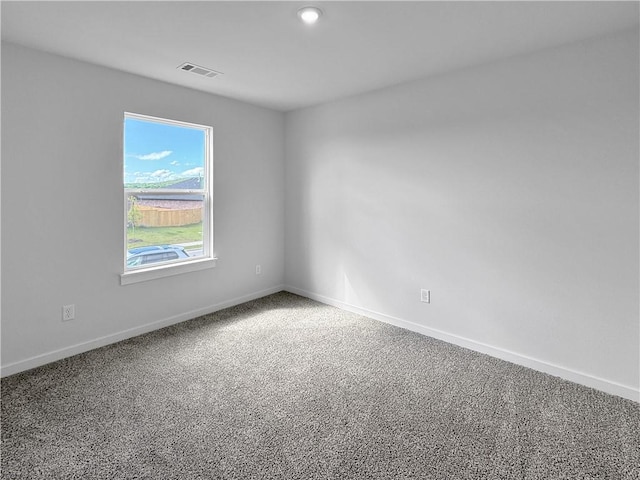 5395 Selah St, Springdale, AR 72764 - spare room featuring carpet flooring and baseboards