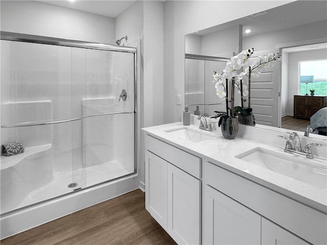 5395 Selah St, Springdale, AR 72764 - ensuite bathroom with wood finished floors, a shower stall, and double vanity