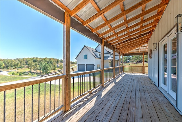 wooden deck with a yard