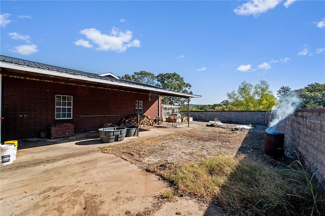 back of property featuring a patio