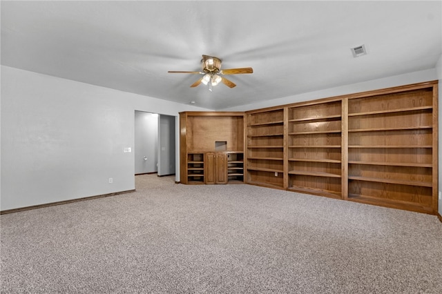 unfurnished bedroom with carpet floors and ceiling fan