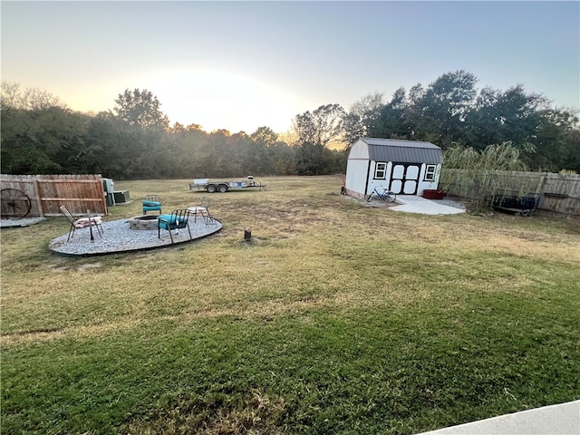 yard at dusk with a shed