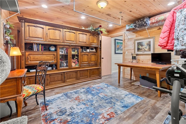 office area featuring wood ceiling, dark hardwood / wood-style floors, and wood walls