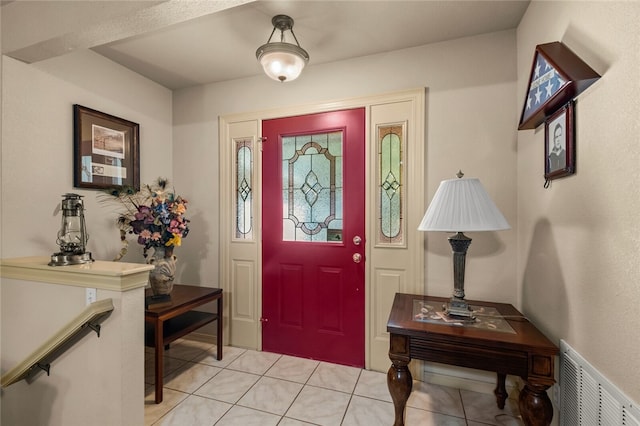 view of tiled foyer entrance