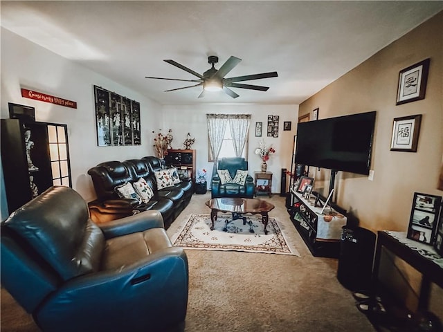 living room featuring ceiling fan and carpet flooring