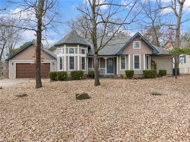 victorian-style house with a garage