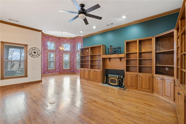 unfurnished living room featuring ceiling fan, ornamental molding, and light hardwood / wood-style floors