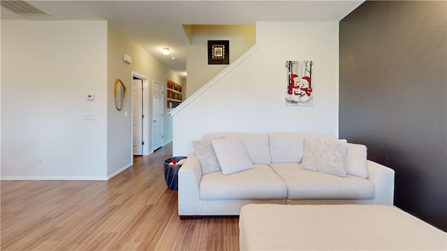 living room with wood-type flooring