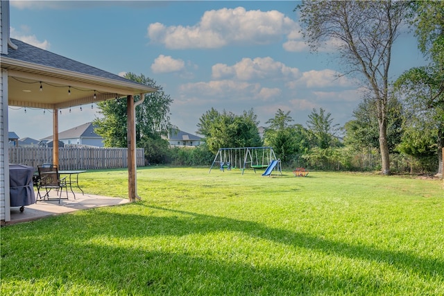 view of yard with a playground