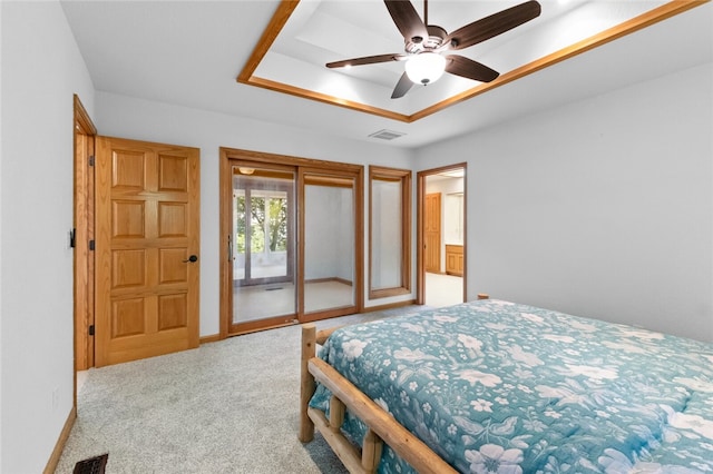 bedroom with ceiling fan, light colored carpet, and access to exterior