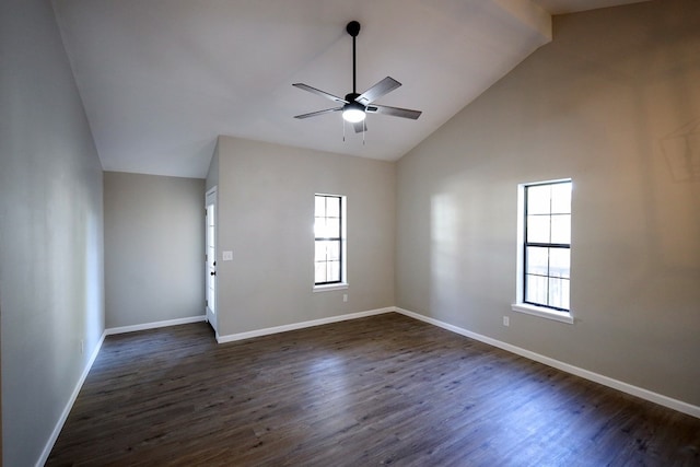 empty room with dark hardwood / wood-style floors, ceiling fan, and lofted ceiling