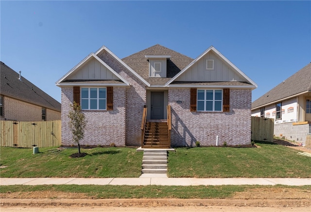 4206 SW Adams St, Bentonville, AR 72713 - craftsman house with brick siding, board and batten siding, and a shingled roof