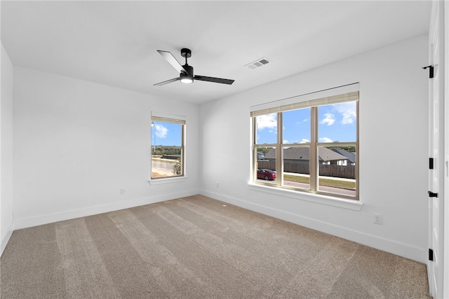 4206 SW Adams St, Bentonville, AR 72713 - empty room featuring baseboards, a ceiling fan, and carpet floors