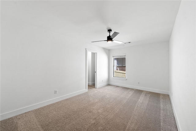 4206 SW Adams St, Bentonville, AR 72713 - spare room with light carpet, a ceiling fan, and baseboards