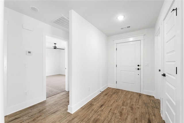 foyer entrance with hardwood / wood-style flooring