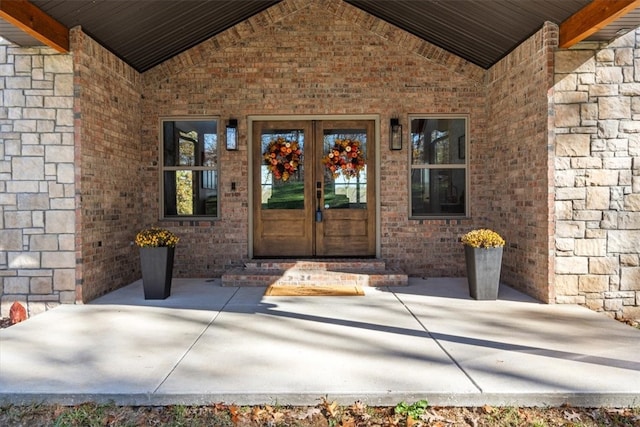 doorway to property featuring french doors