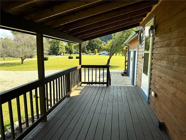 deck featuring a lawn