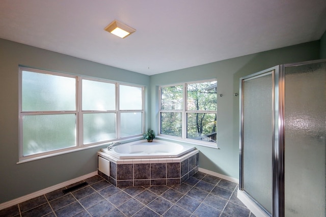 bathroom with plus walk in shower and tile patterned floors