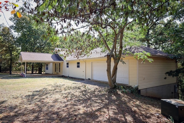 ranch-style house featuring a garage