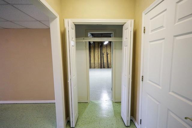 corridor with a drop ceiling