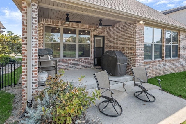 view of patio / terrace with a grill and ceiling fan